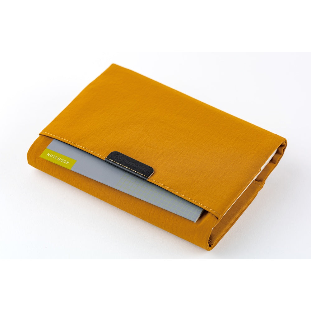 Mustard Notebook holder with a card holder on a white background
