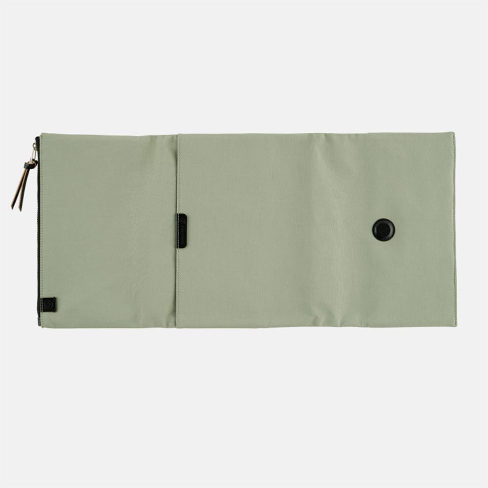 Oakmoss green fabric Tragen zippered cover for Hobonichi Techo Cousin A5 planner on white background