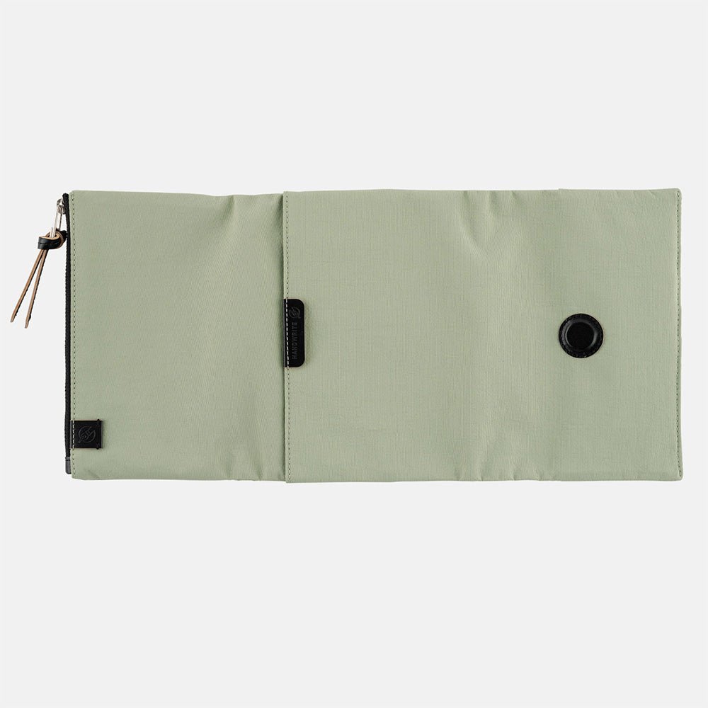 Oakmoss green zippered Tragen cover for Hobonichi Techo A6 planner on white background