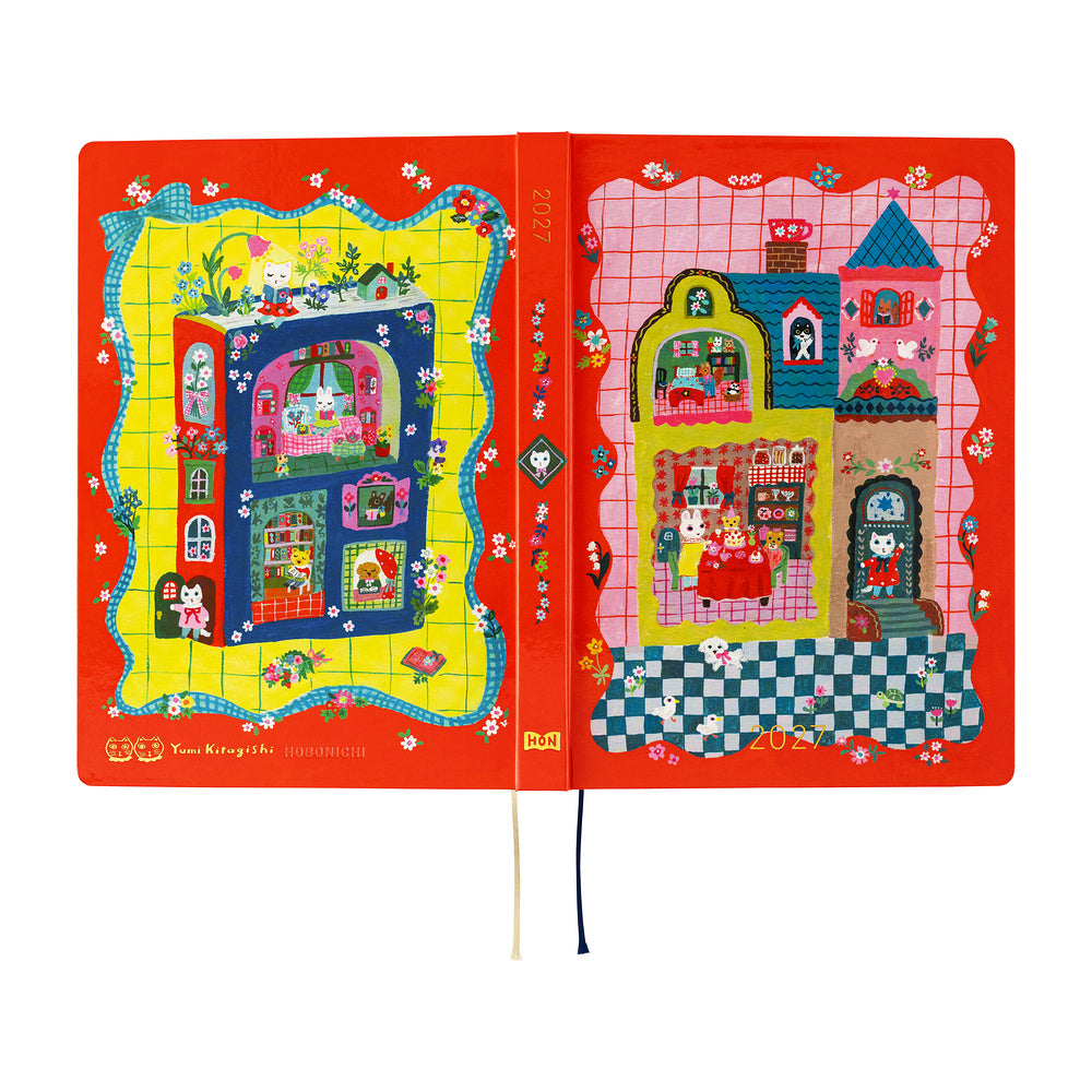 A flat outside view of the red 2027 Hobonichi Techo HON hardcover planner featuring Yumi Kitagishi’s colorful dollhouse illustration with cats, rabbits, flowers, and other playful details on a white background.