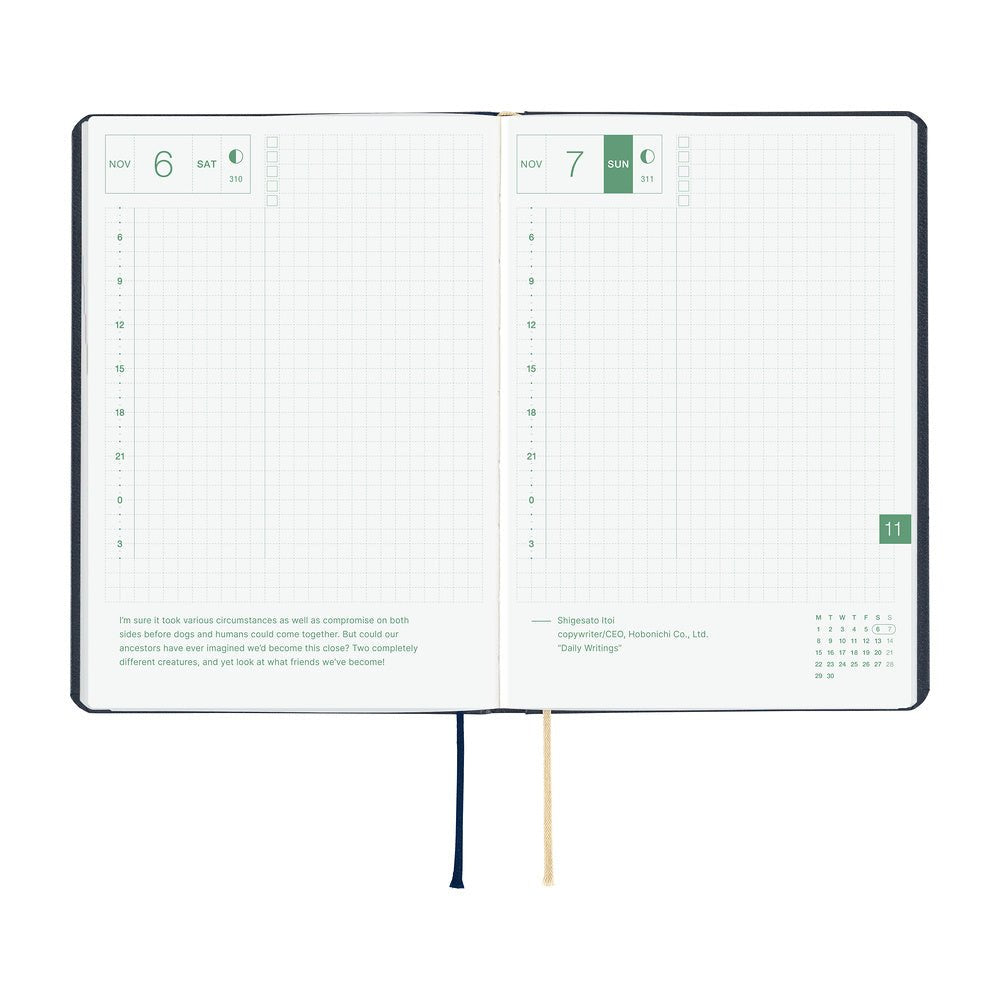 An open 2027 Hobonichi Techo HON hardcover planner showing two daily grid pages for November 6 and 7, with timelines, checkboxes, quotes, and two ribbon bookmarks on a white background.