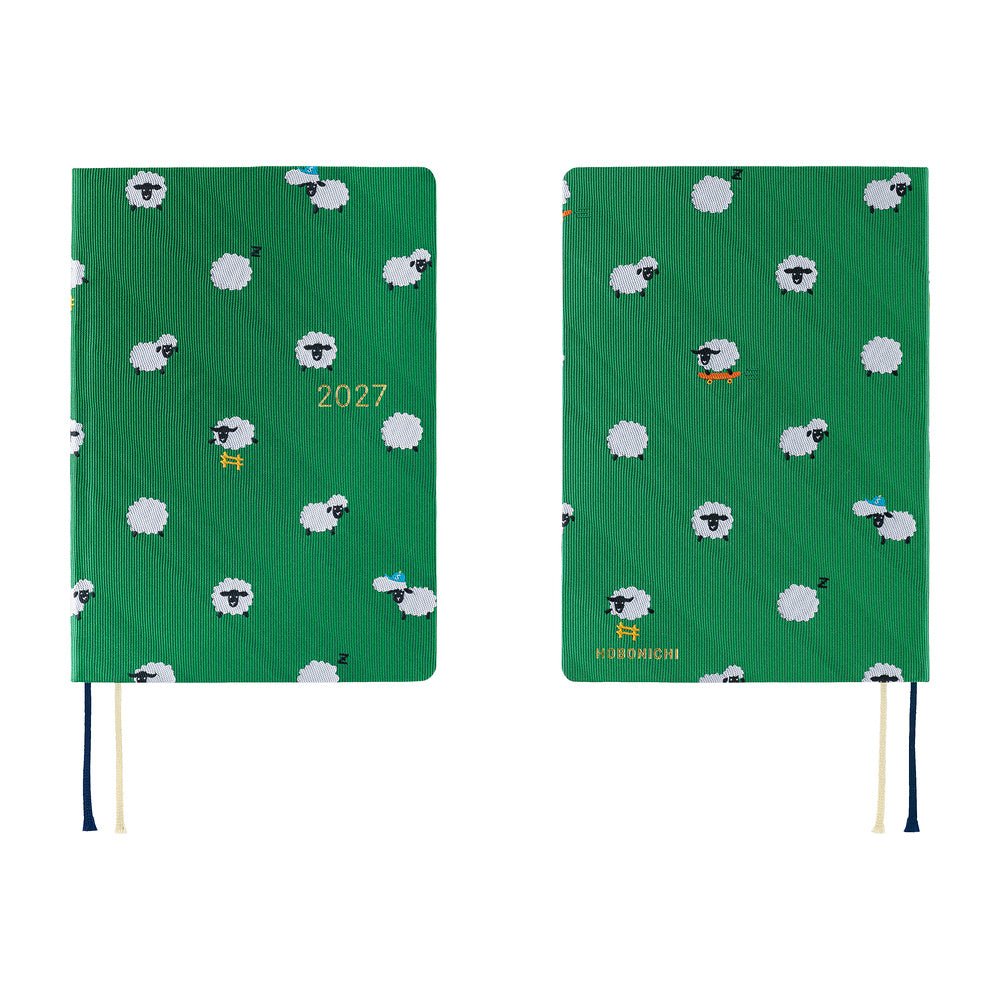 A 2027 Hobonichi HON covered in Bow & Tie fabric woven with a sheep design on a green background
