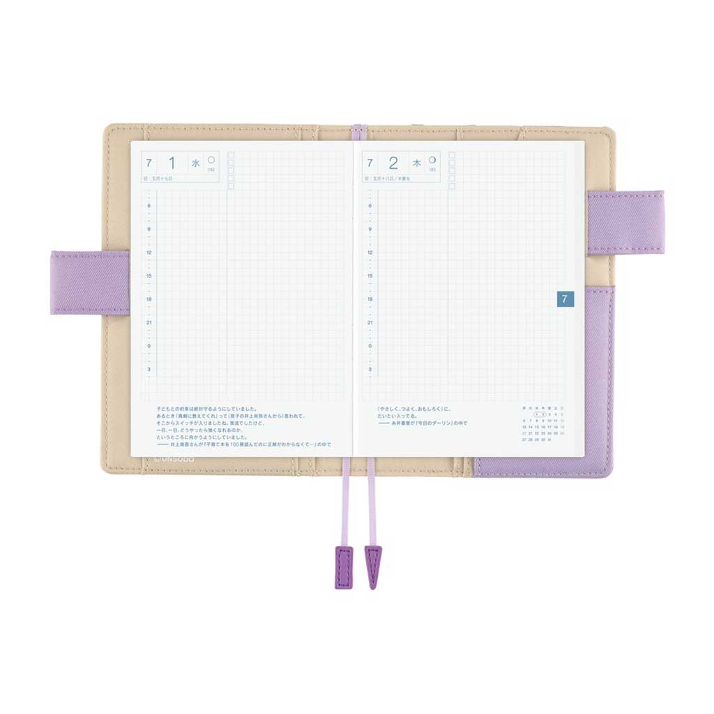Beige and light purple interior of Hobonichi Techo A6 Original Unsodo cover with planner book open on white background