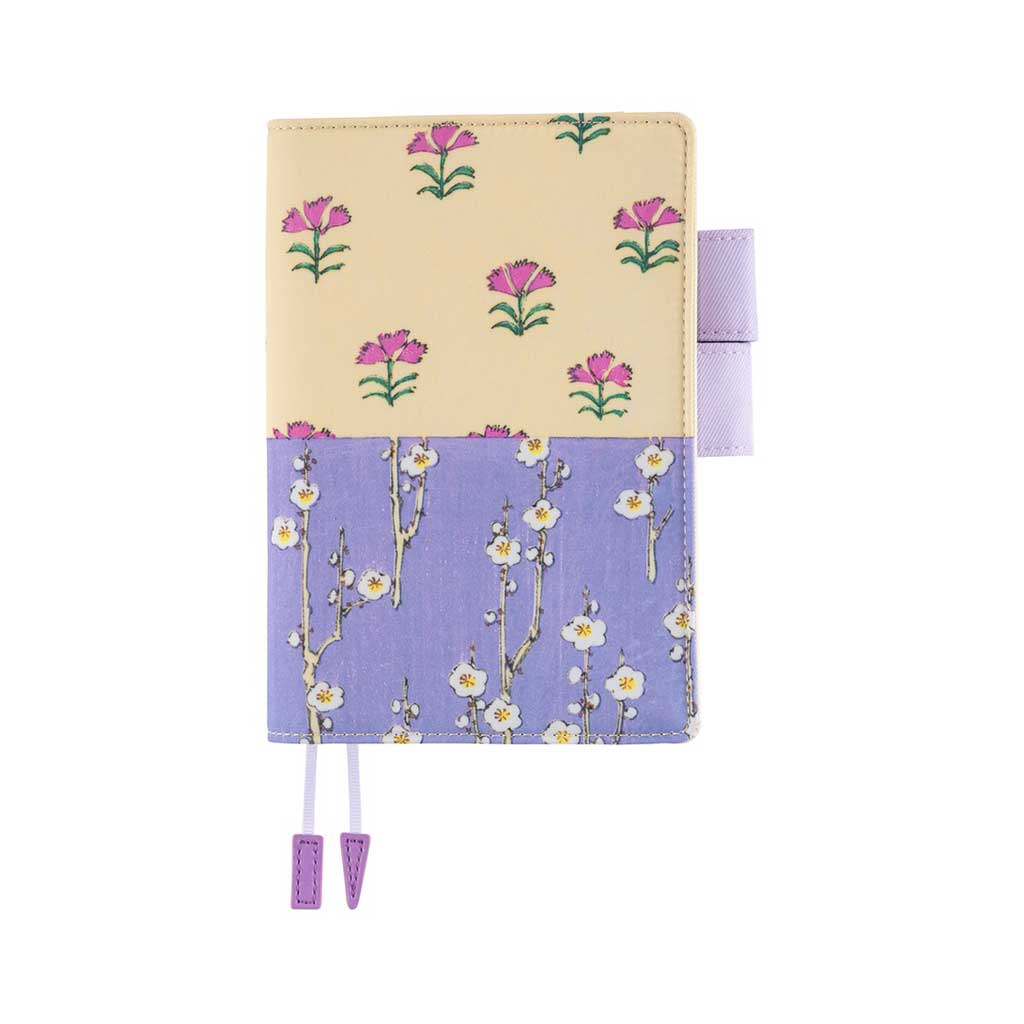 Front of Hobonichi Techo A6 Original Unsodo Book in ivory and purple floral cover with purple pen loops on white background