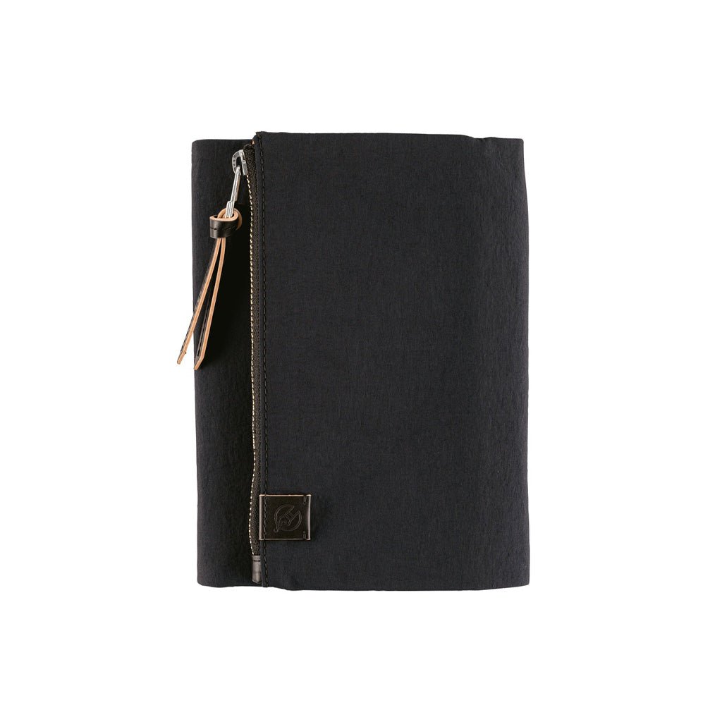 Black zippered Tragen cover for Hobonichi Techo A6 planner on white background