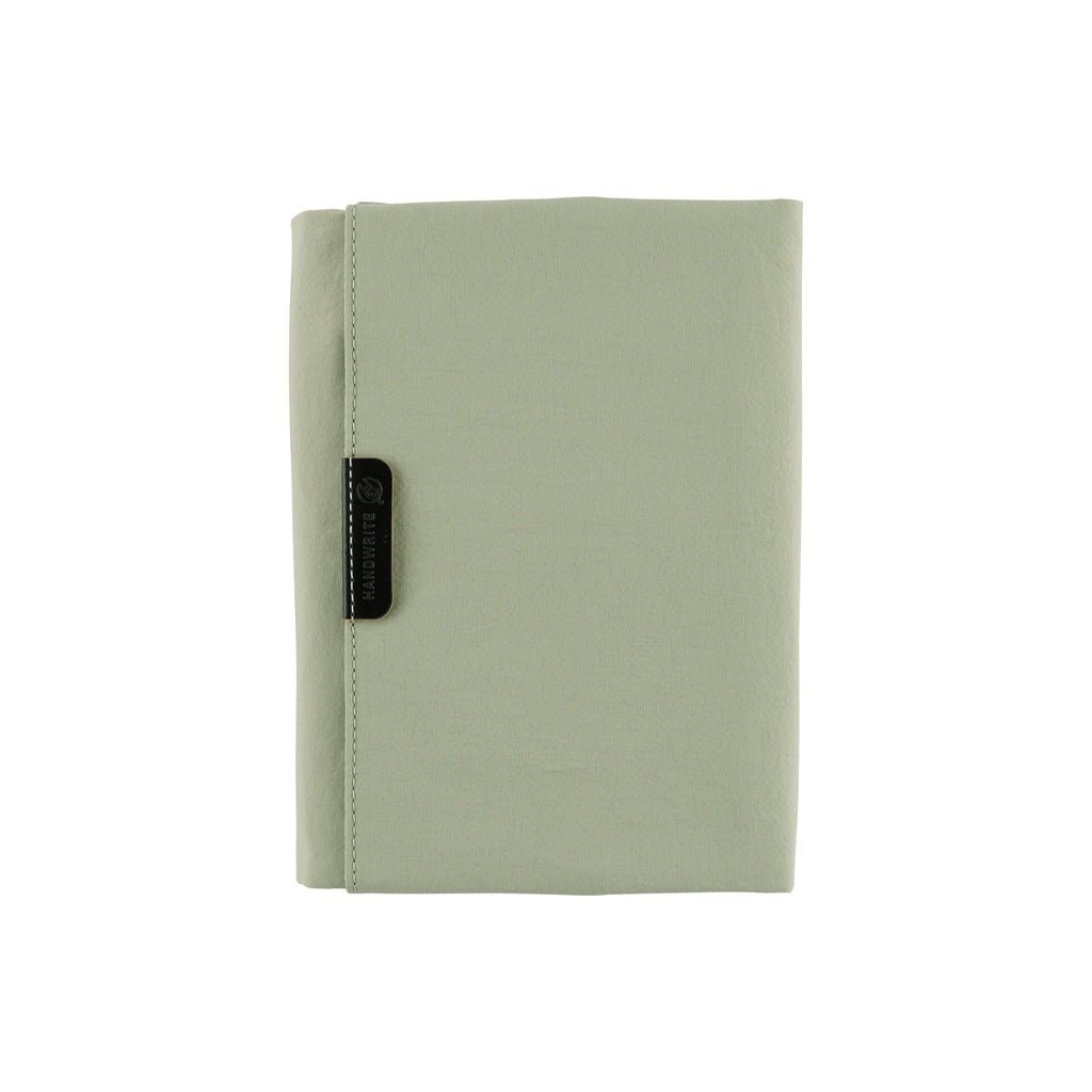 Oakmoss green zippered Tragen cover for Hobonichi Techo A6 planner on white background