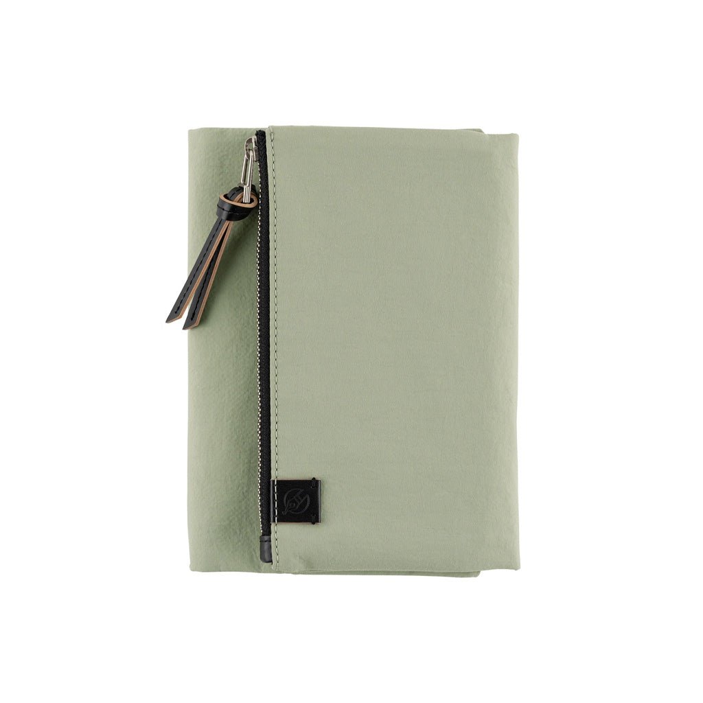 Oakmoss green zippered Tragen cover for Hobonichi Techo A6 planner on white background
