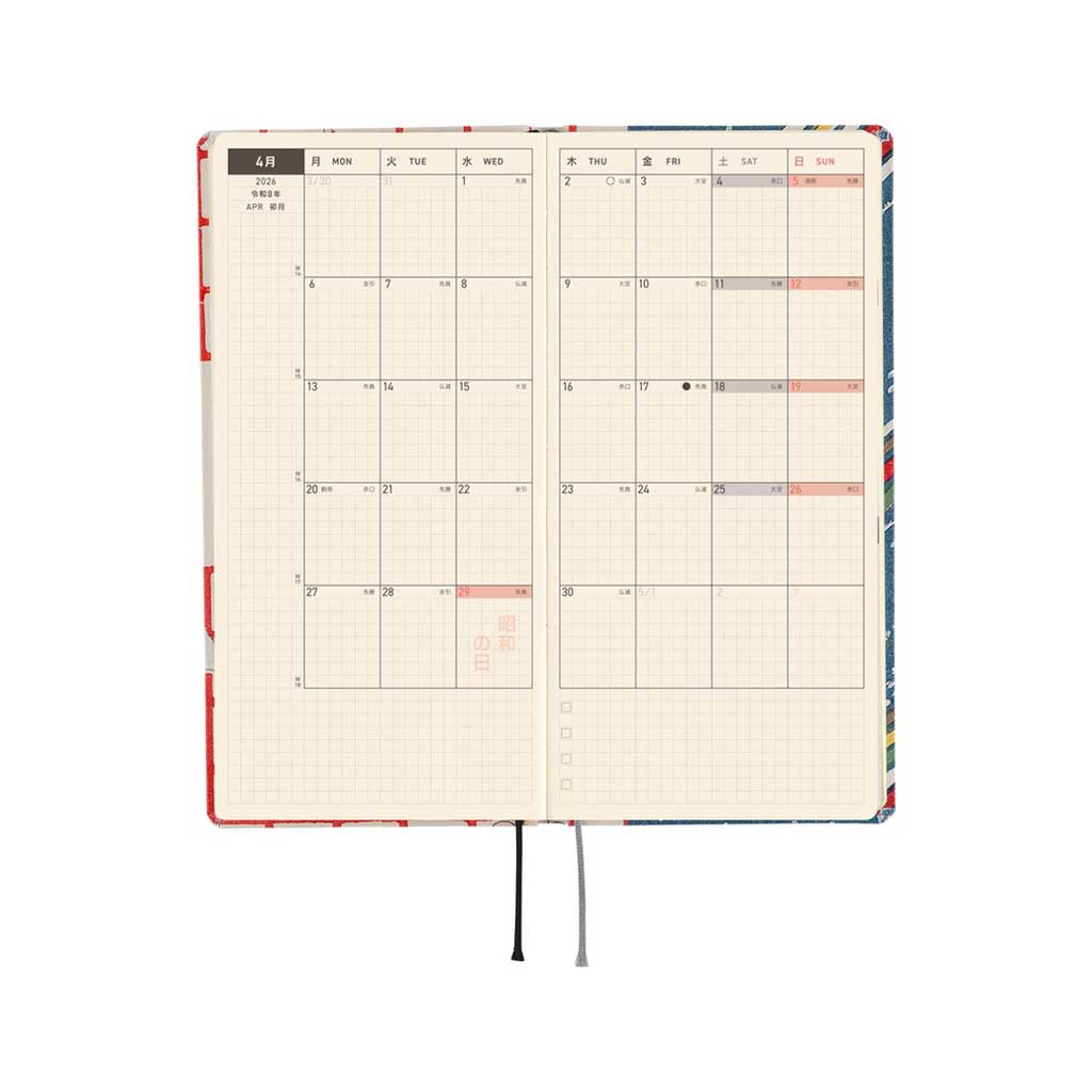 Inside of Hobonichi Techo Weeks Unsodo Spring Start Weeks planner with monthly spread laying flat on white background