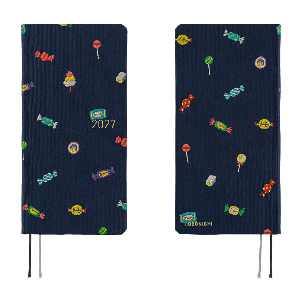 A front and back view of a 2027 planner featuring an array of colorful candies woven into a dark navy blue necktie fabric.