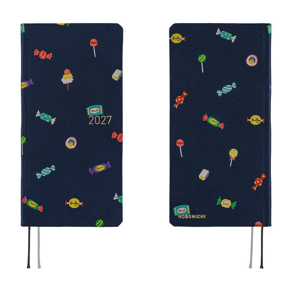 A front and back view of a 2027 planner featuring an array of colorful candies woven into a dark navy blue necktie fabric.