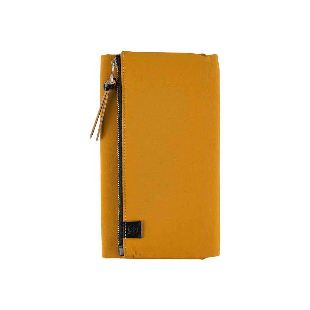 Front of mustard yellow fabric Tragen zippered cover for Hobonichi Techo Weeks planner on white background