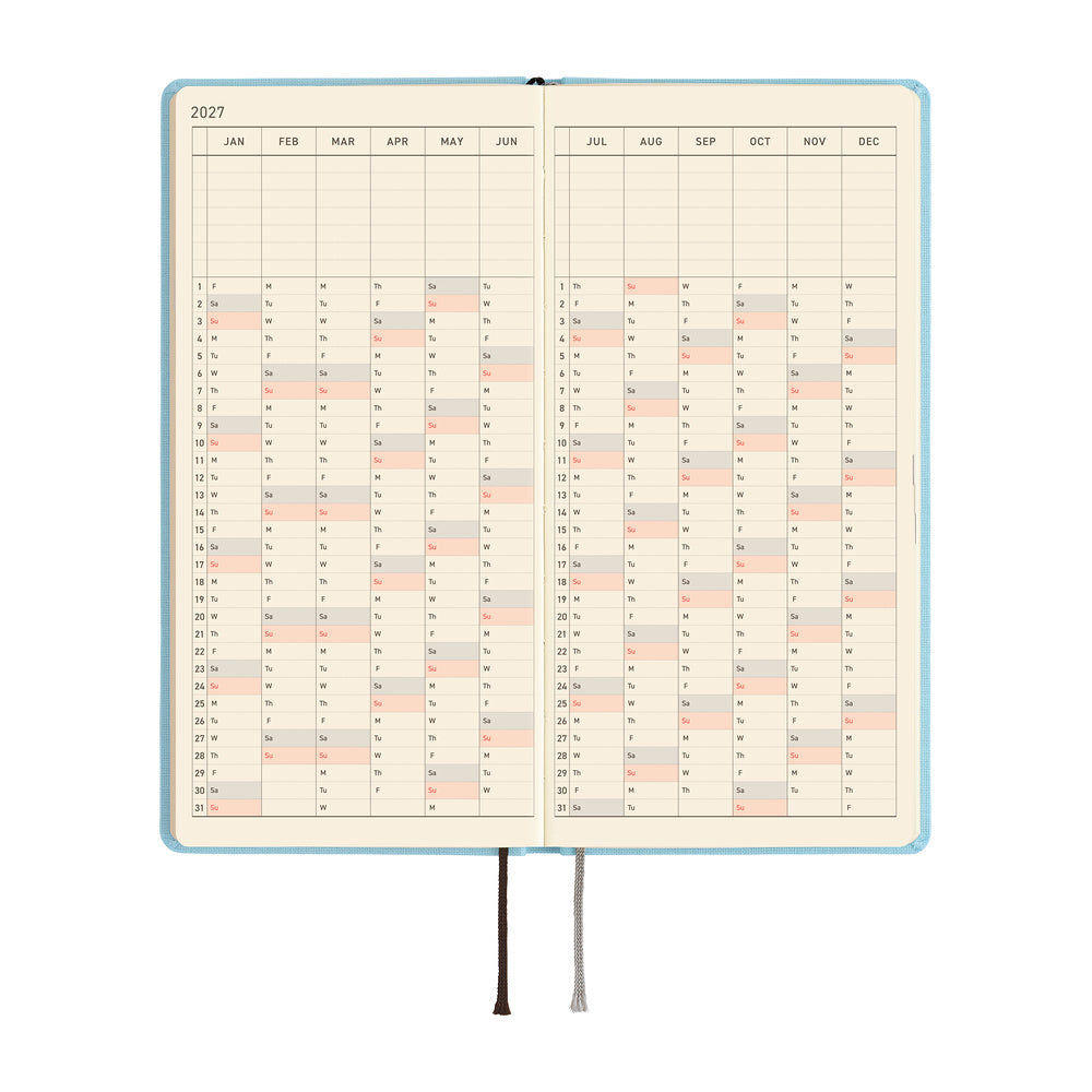 An open 2027 planner showing a yearly calendar in a vertical format on cream-colored pages.