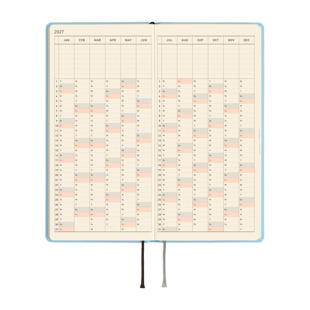 An open 2027 planner showing a yearly calendar in a vertical format on cream-colored pages.