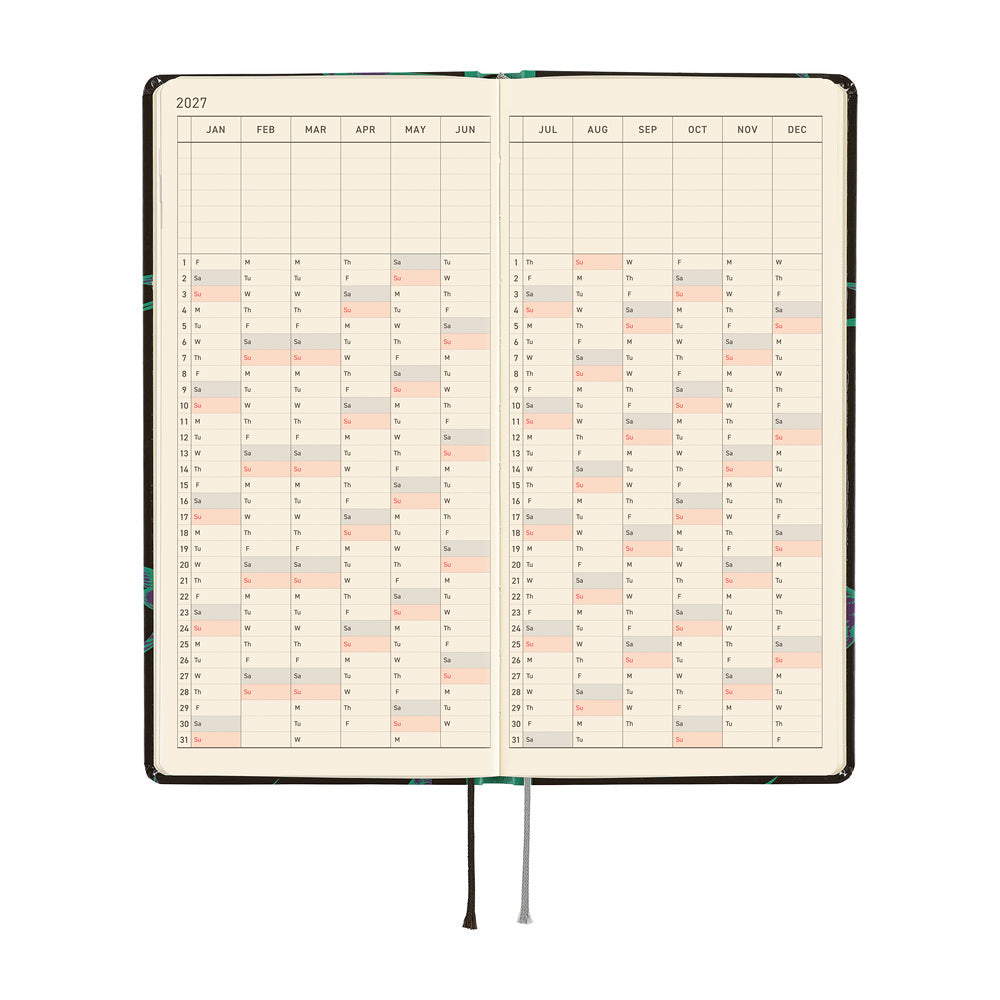 An open 2027 planner showing a two-page yearly calendar spread. The pages are cream-colored, and a thin gray ribbon bookmark hangs below.