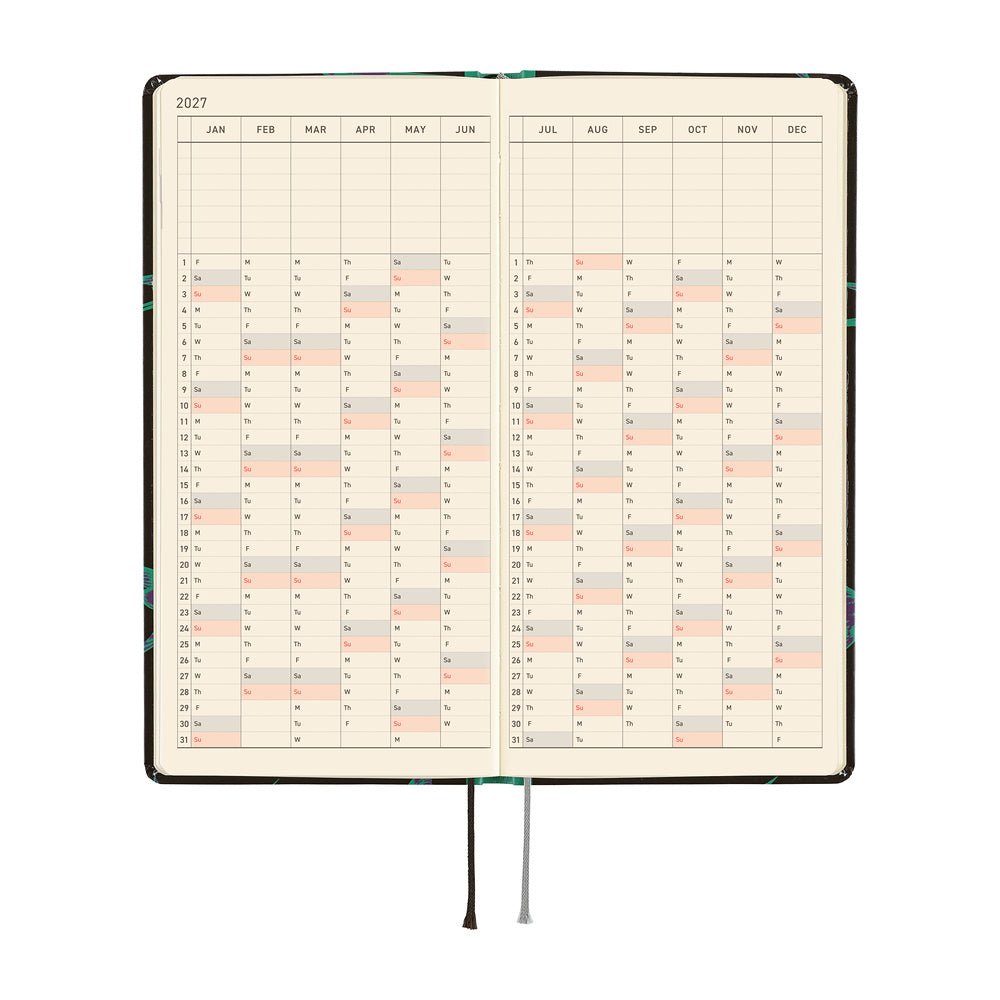 An open 2027 planner showing a two-page yearly calendar spread. The pages are cream-colored, and a thin gray ribbon bookmark hangs below.