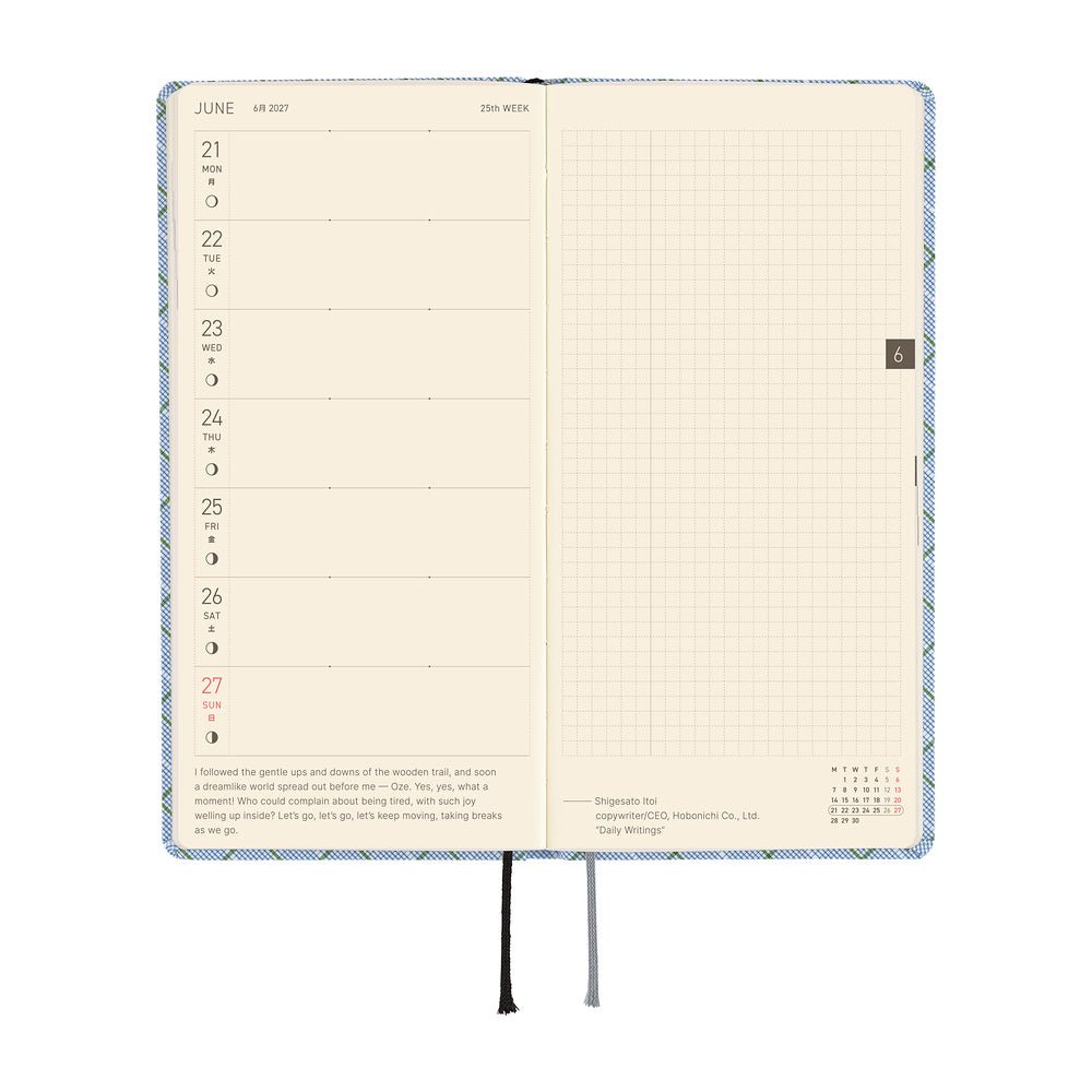 An open weekly planner spread with cream-colored pages. The left-side page has a weekly calendar, while the right page is a grid.