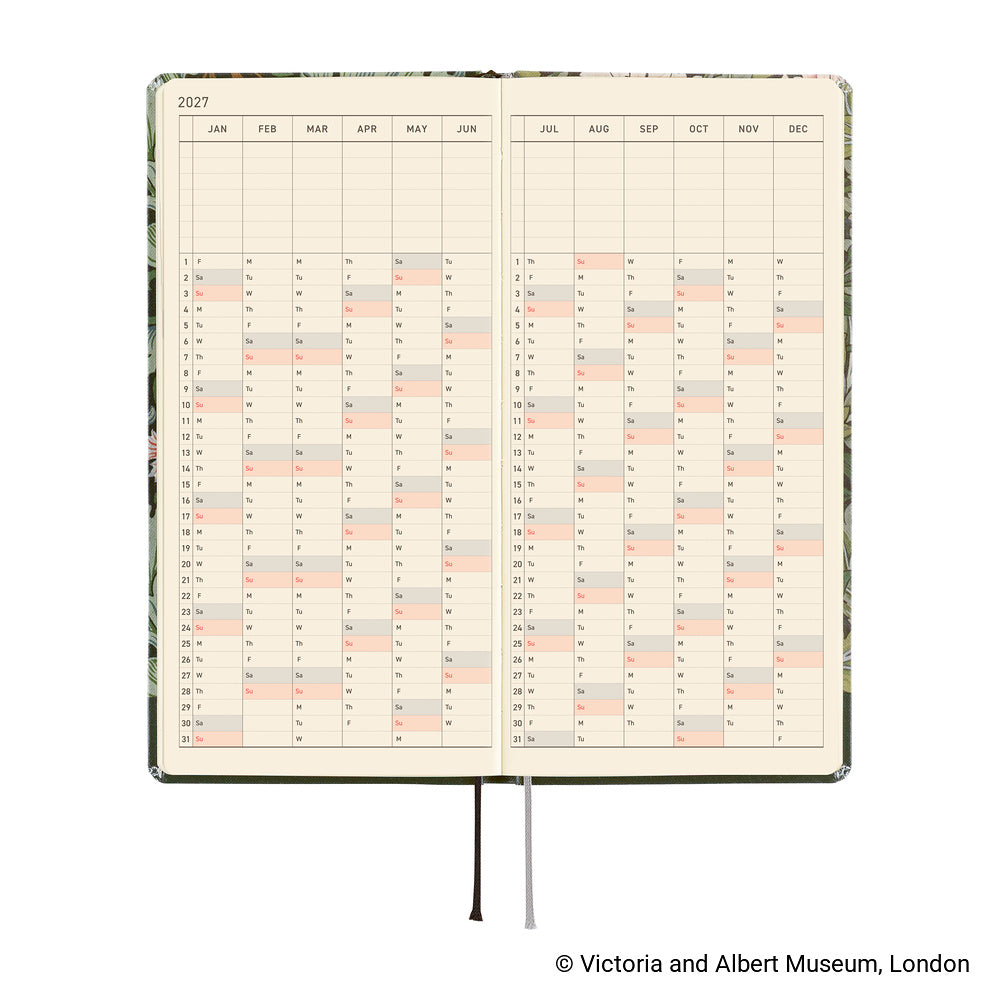 An open 2027 daily planner spread showing two printed calendar pages with a yearly grid, photographed on a white background.