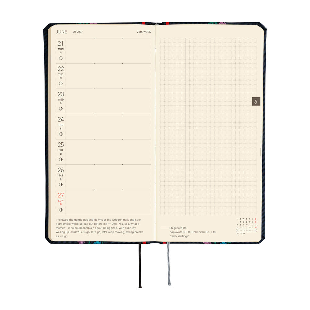 An open weekly planner spread with cream-colored pages. The left side features a Monday through Sunday layout, while the right side is an open grid.