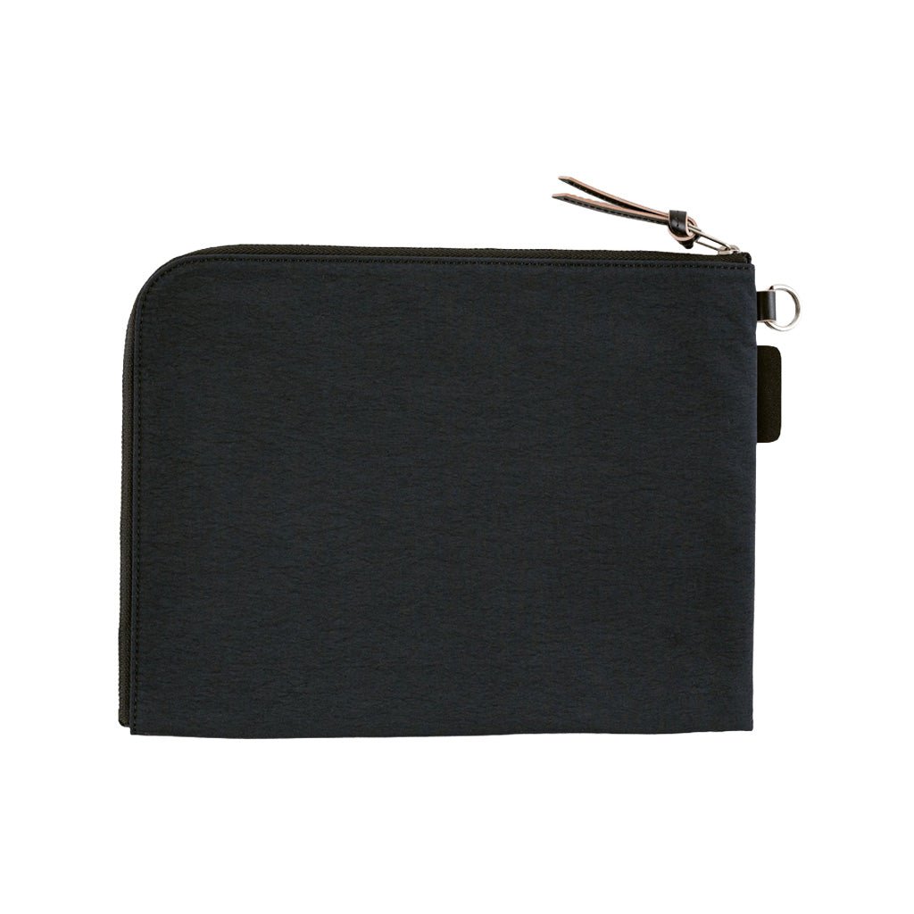 A black A5 zippered tragen flat pouch closed on white background