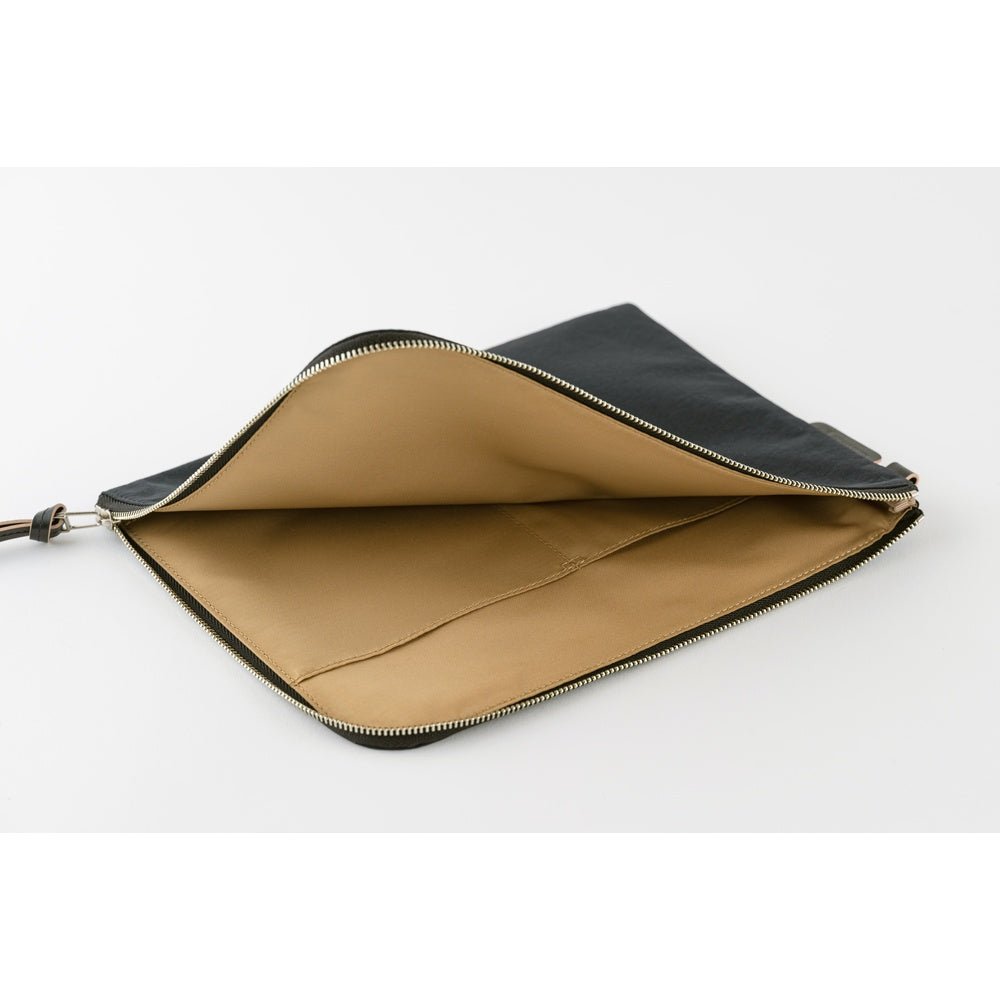 A black A5 zippered tragen flat pouch open with tan interior on white background