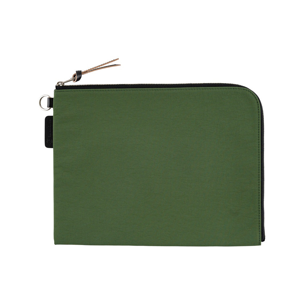A green A5 zippered tragen flat pouch closed on white background
