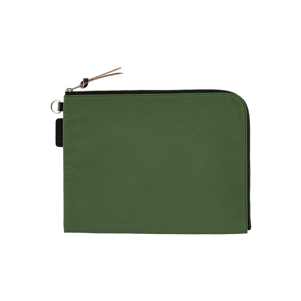 A green A6 zippered Tragen flat pouch on white background