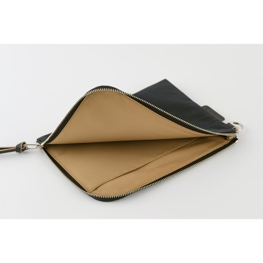 An open zippered pouch with a tan interior lining and a black exterior, shown on a clean white background.