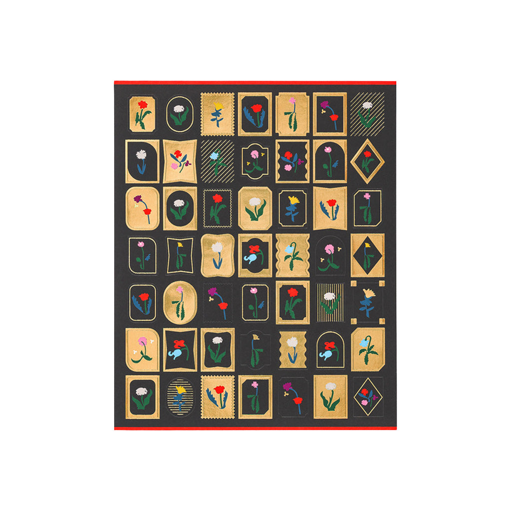 Sheet of Yoshie Watanabe stickers with gold foiling and colorful flower motifs on white background