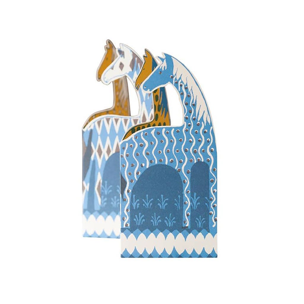 Pop-up greeting card featuring patterned horses in shades of blue and white, standing upright.