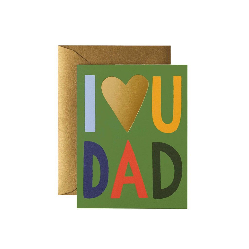 A colorful greeting card with the text 'I heart U Dad' on a green background, accompanied by a brown envelope.