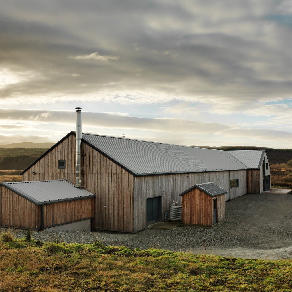 A large rustic wooden barn.