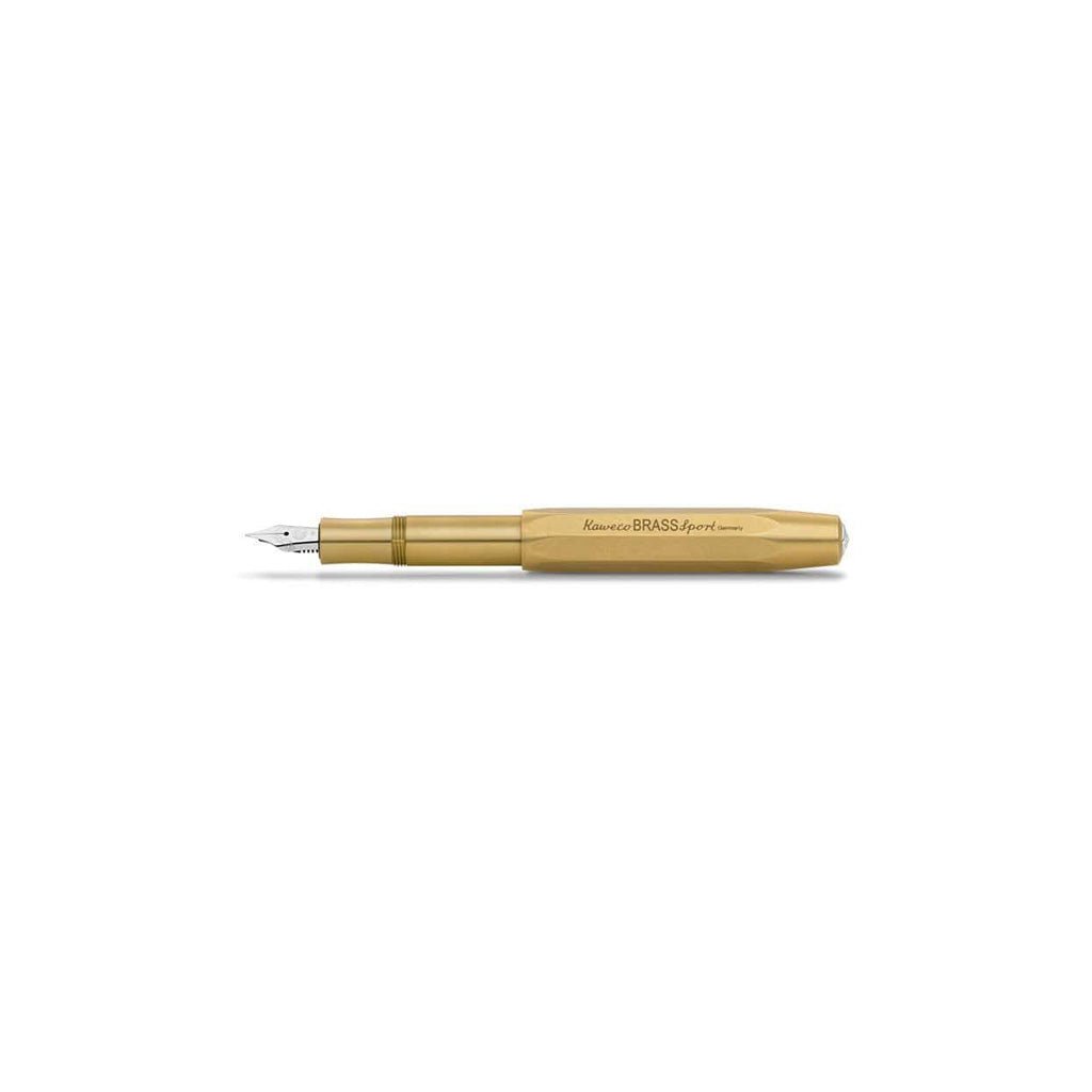 Brass fountain pen with silver nib on white background