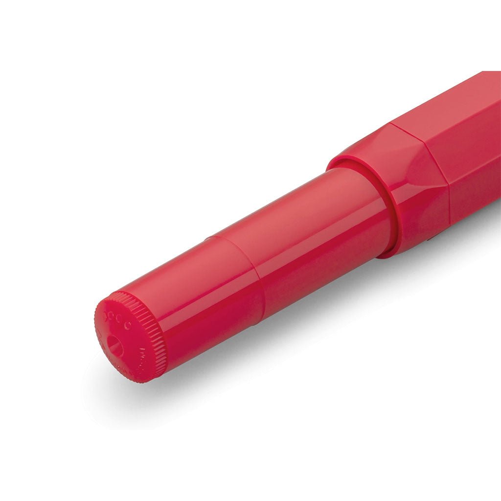 End of red fountain pen on white background