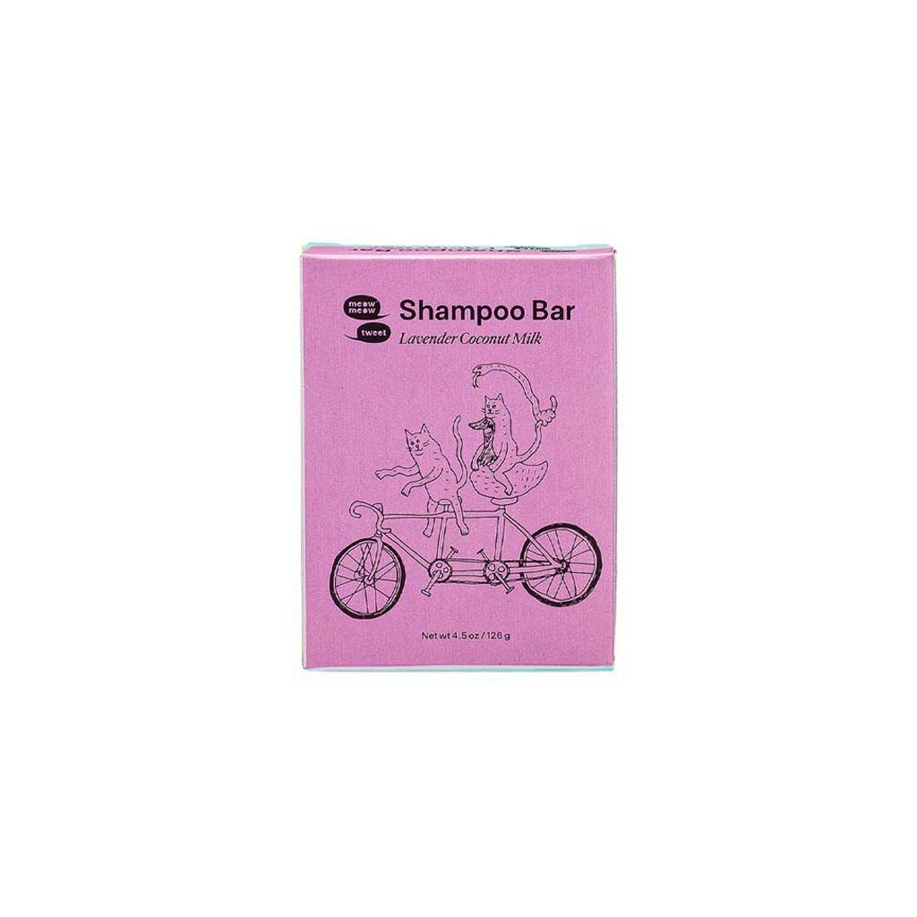 Pink box of a shampoo bar with cartoon cats on a bicycle design.