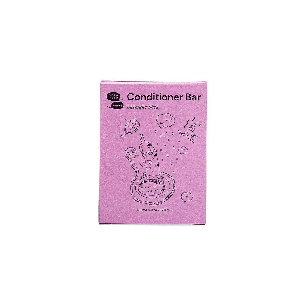 Pink box of a conditioner bar with cartoon illustrations on a white background