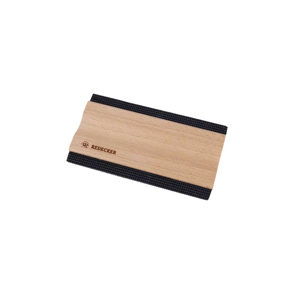 Wooden lint remover comb on white background