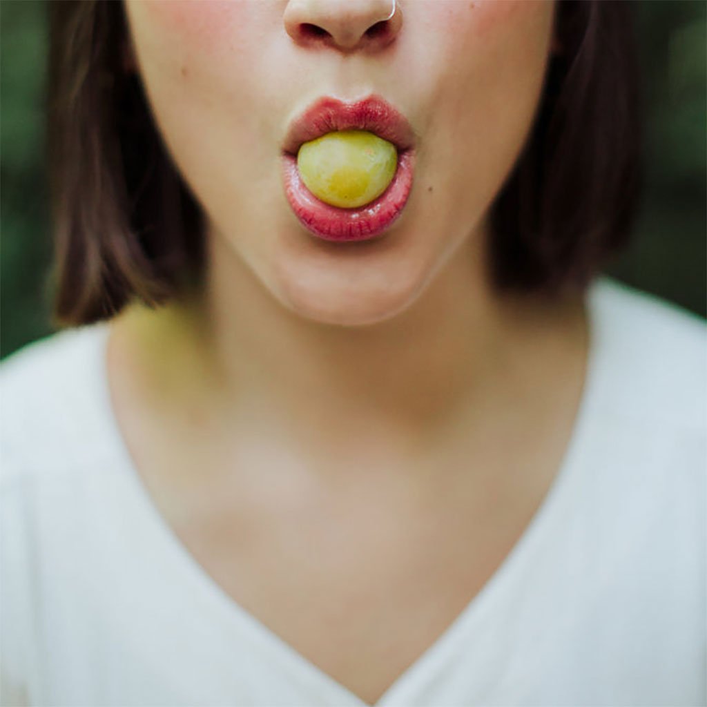 A person wearing lip stain