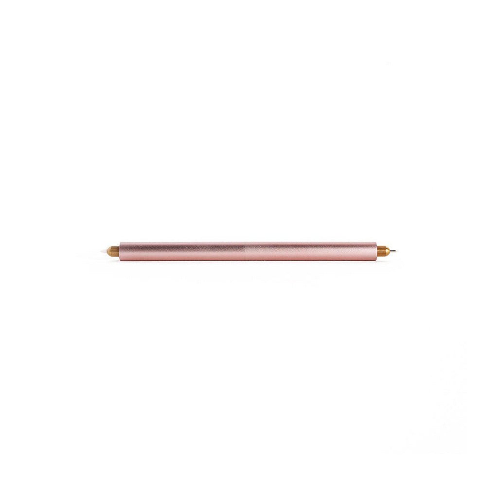 Rose gold pen on a white background