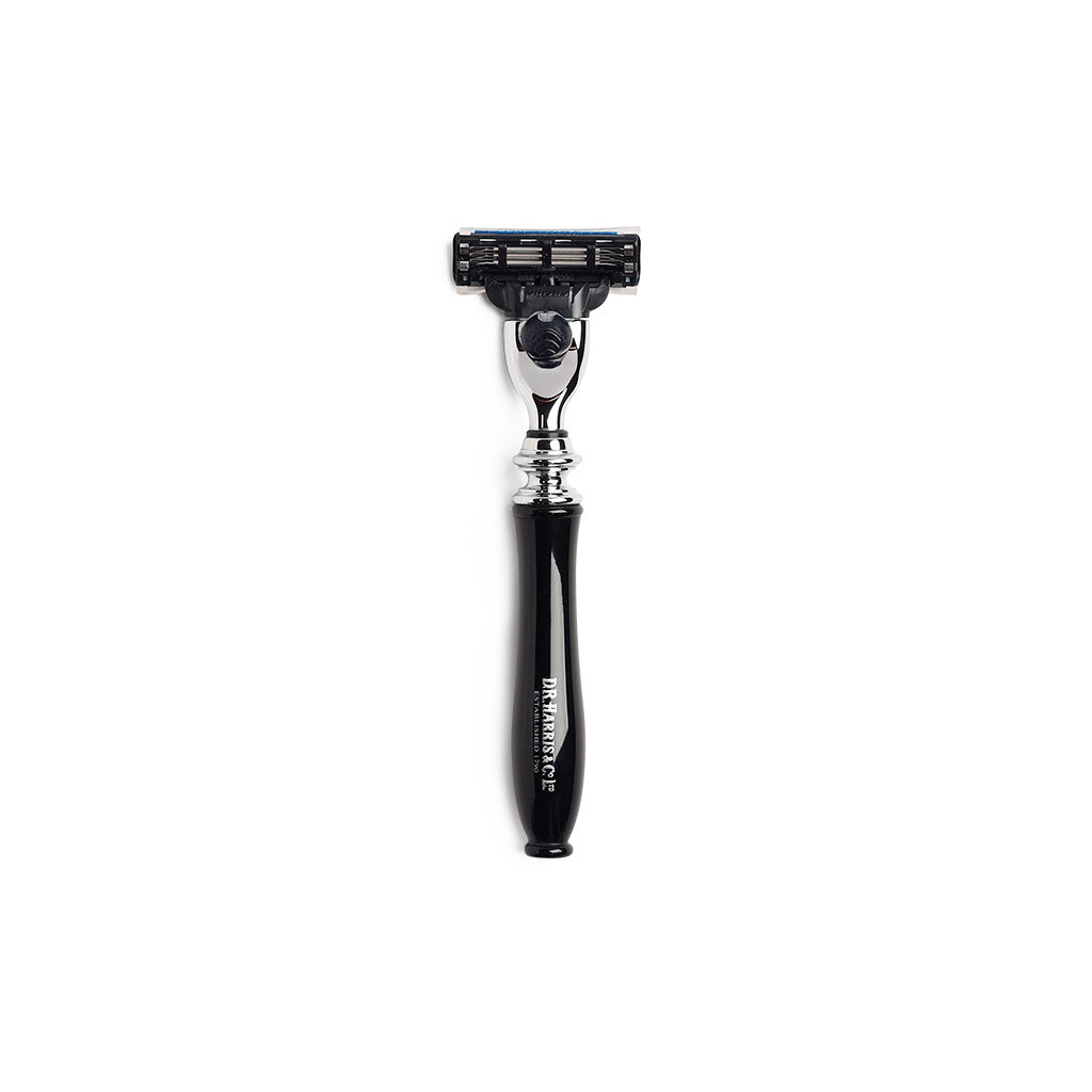 Chrome razor with imitation ebony handle and D.R. Harris branding on white background