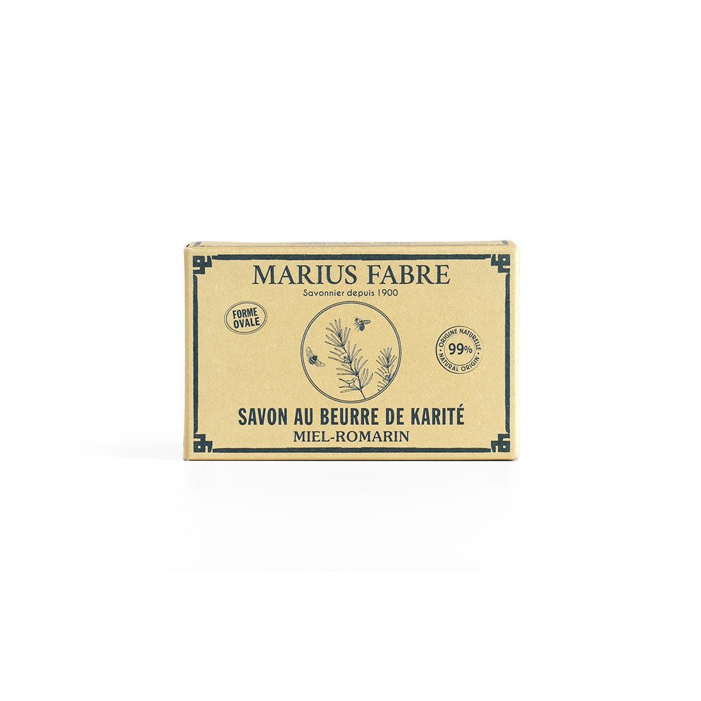 A rectangular cream colored cardboard box of Marius Fabre Savon au Beurre de Karité.