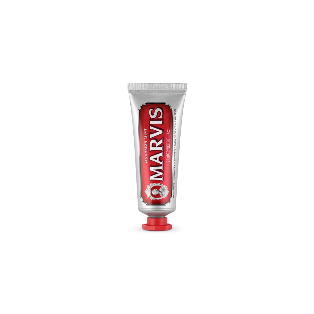 Travel-size tube of Cinnamon Mint Marvis toothpaste.