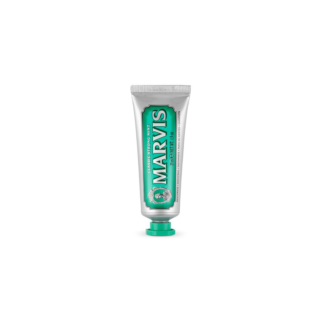 Travel-size tube of Classic Strong Mint Marvis toothpaste.