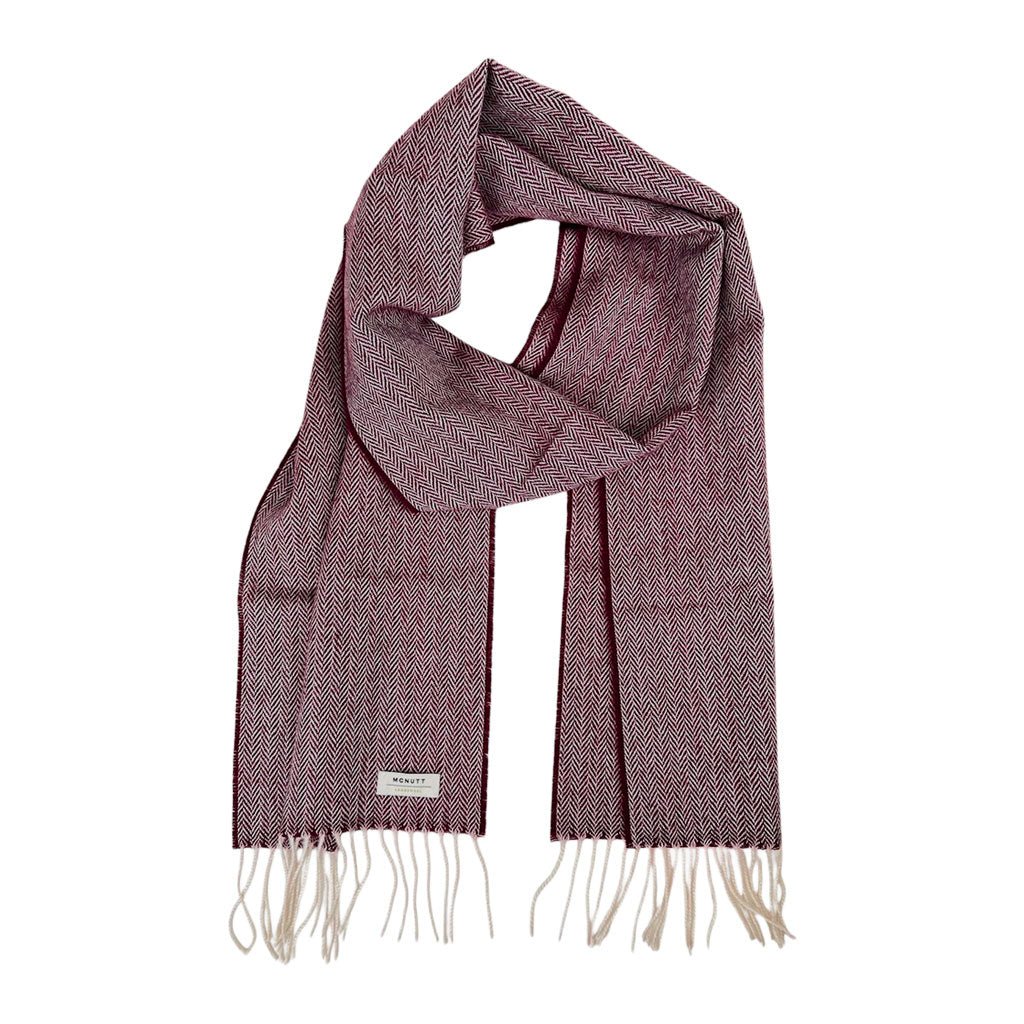 Mulberry lambswool scarf arranged in a loop on a white background.