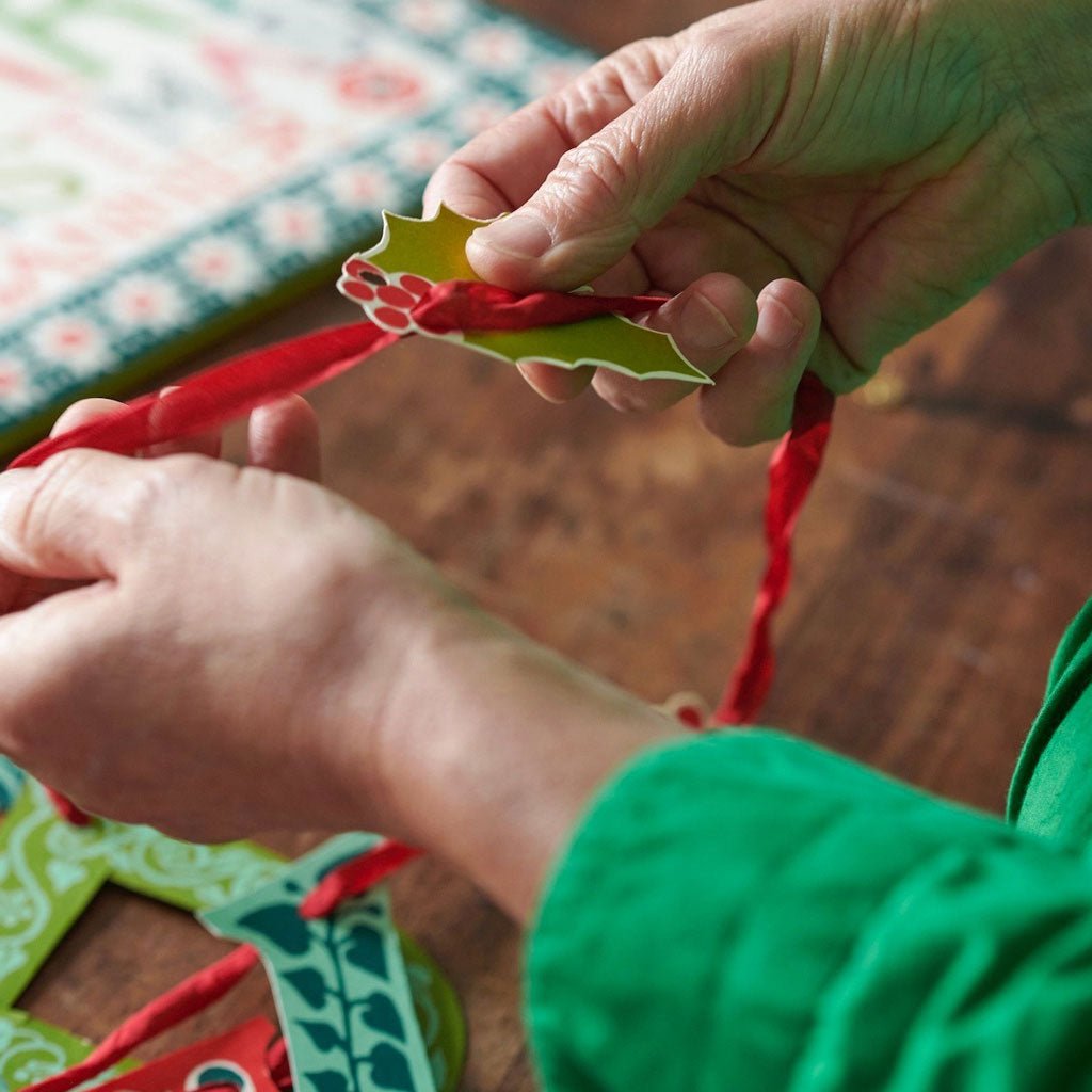 A person assembling the banner