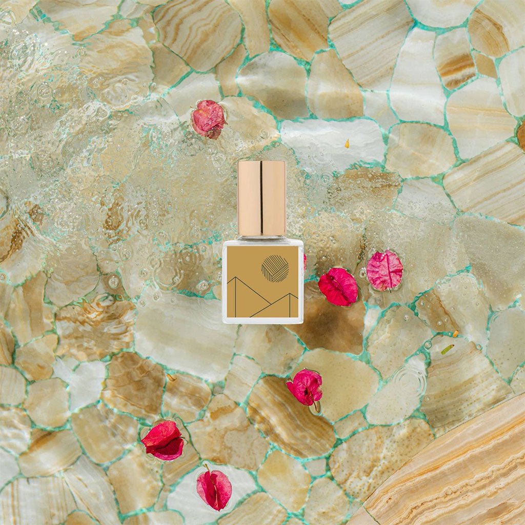 Bottle of Mezcal Añejo Perfume Oil on decorative background