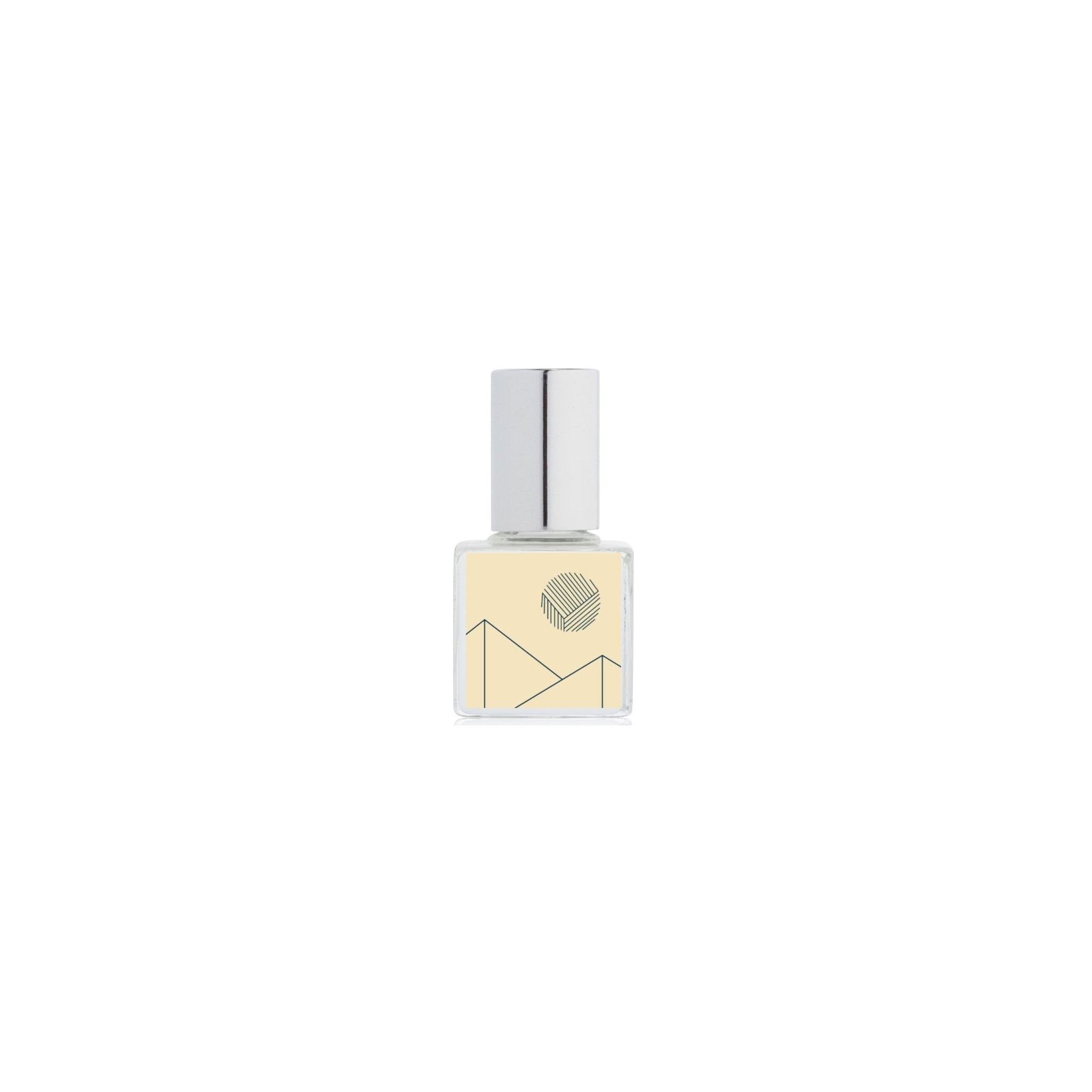 Perfume bottle with geometric design on a white background