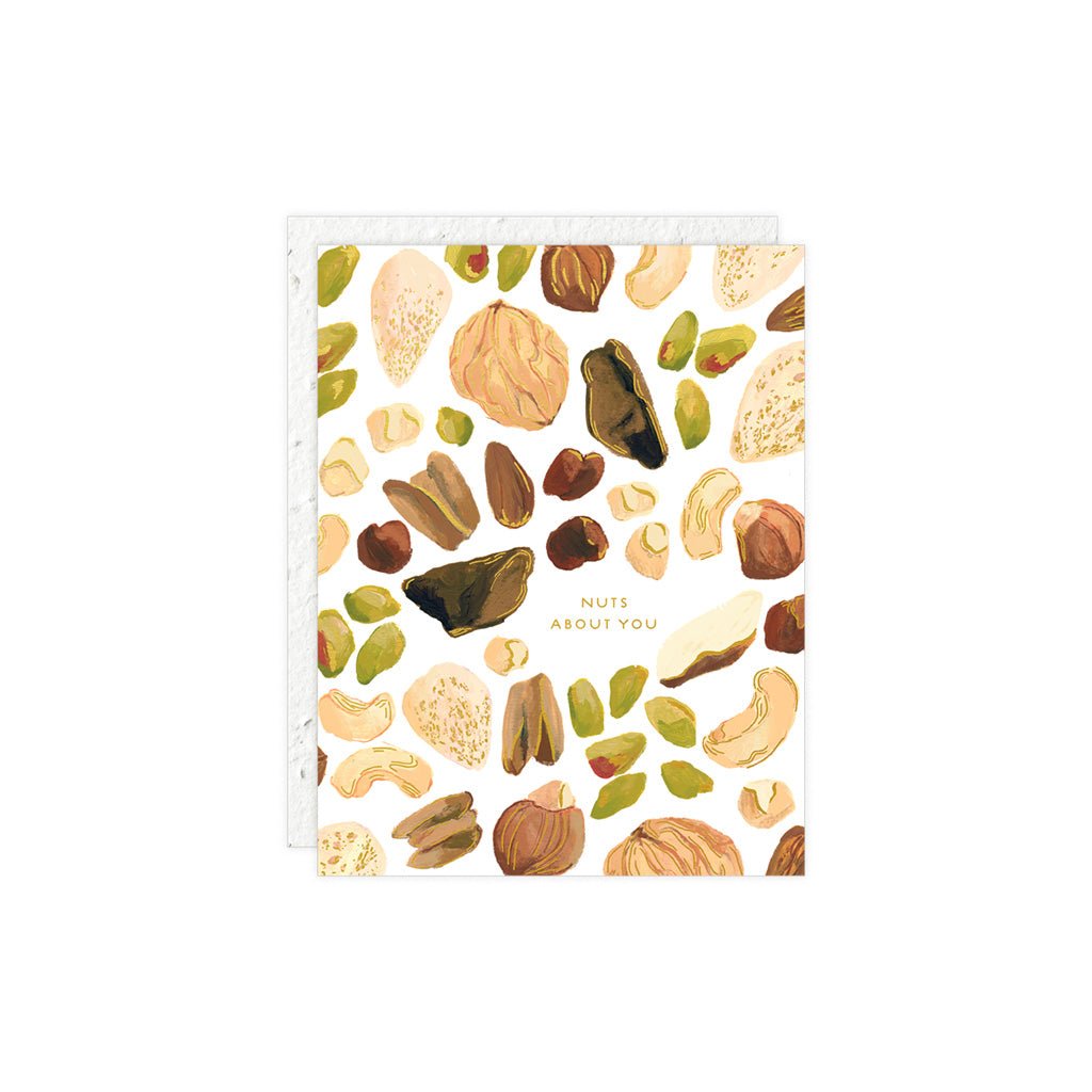 Front of greeting card with assortment of nuts and text that reads nuts about you