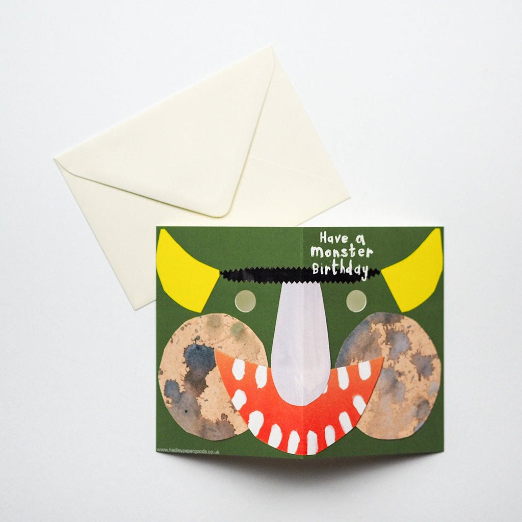 Monster Birthday Mask Card laying flat with cream envelope