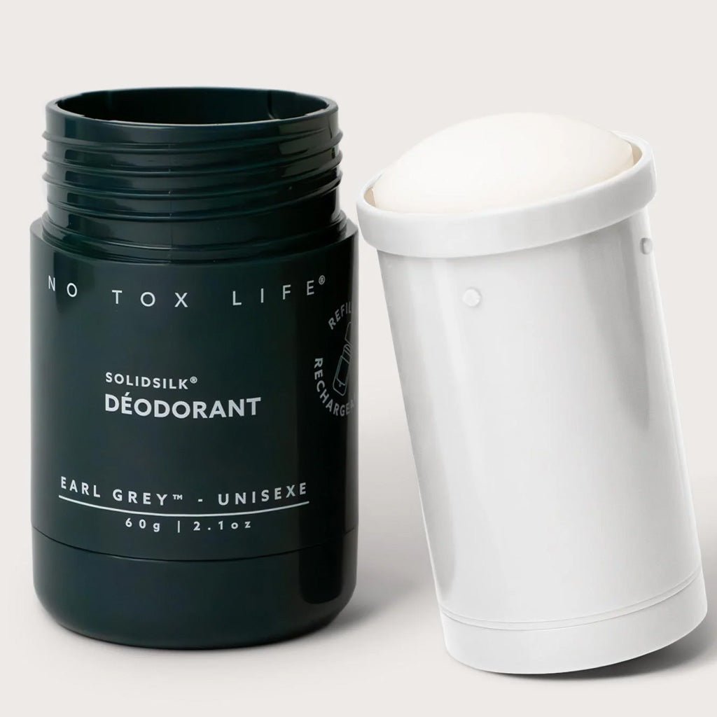 No Tox Life Earl Grey Deodorant tube empty next to white refill capsule.