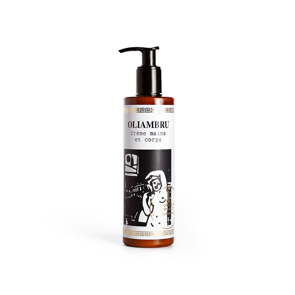 Pump bottle of hand and body cream on white background.